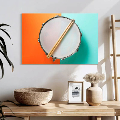 Drum And Sticks On Table