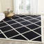Tapis noir / blanc en laine touffeté à la main Sanyla-1627703373