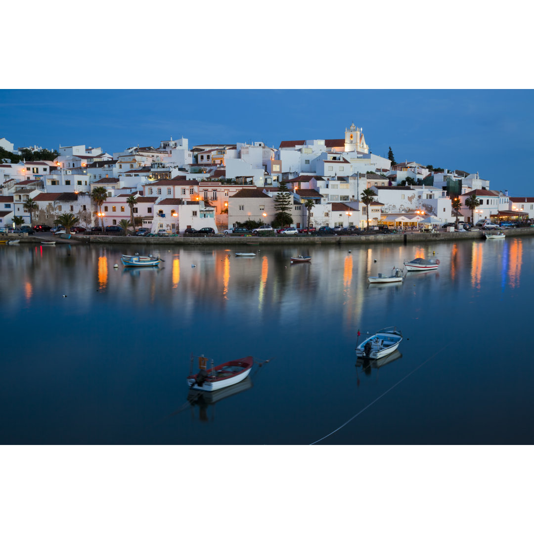 Water View Of Illuminated Cityscape von LucynaKoch - Leinwand Kunstdrucke