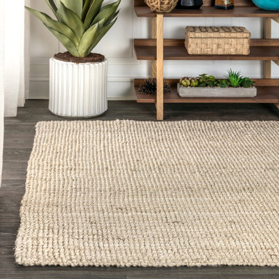 Tapis ivoire clair en jute tissé à la main Pata