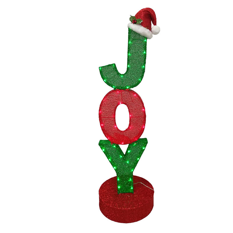 Figurine "JOY" avec chapeau de père Noël