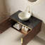Ensemble de meuble-lavabo spacieux avec lavabo, comptoir en pierre noire au fini chêne brun