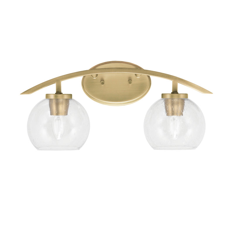 Kurve 2 Light Bath Bar Shown In New Age Brass Finish With  5.75" Clear Bubble Glass