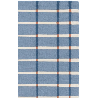 Tapis rayé bleu / ivoire en laine et coton touffeté à la main Zoticus