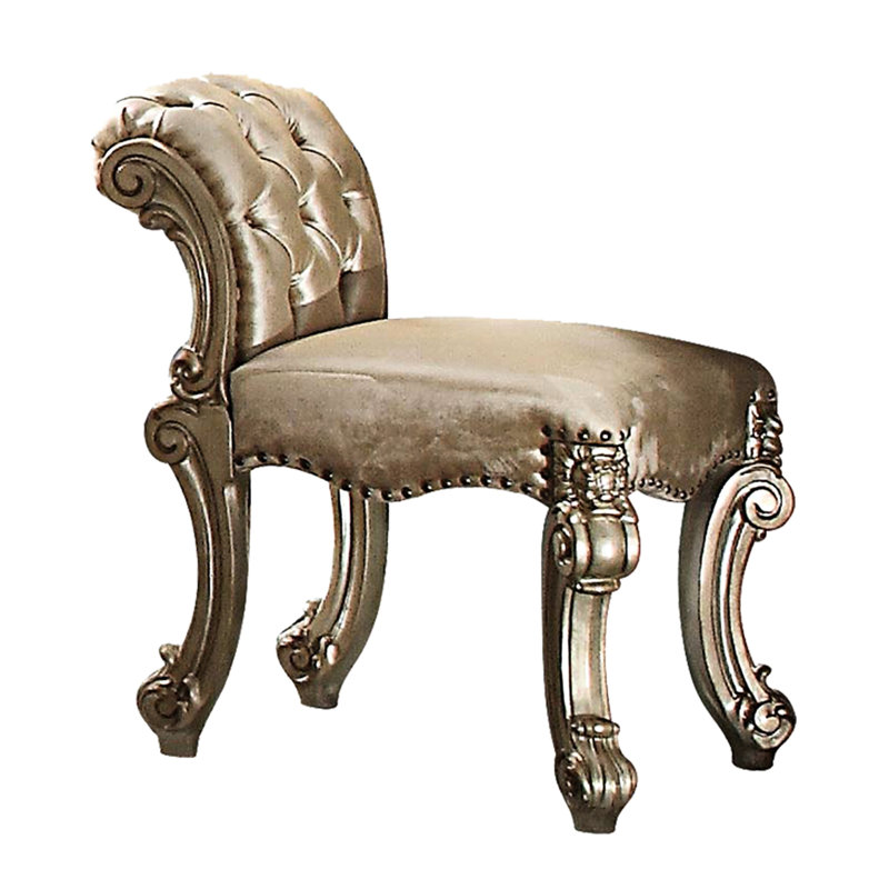 Siège de coiffeuse sophistiqué en tissu patine dorée et os raffiné avec base à volutes