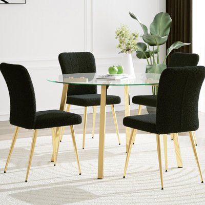 Élégante table de salle à manger ronde en verre et 4 chaises noires, en métal doré, style simple pour les chaises, table moderne, surface lisse, utilisation dans la cuisine