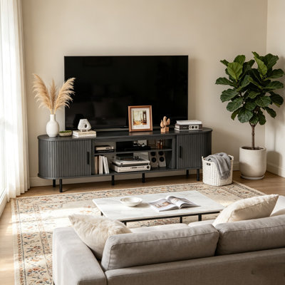 Meuble télé 80 po avec foyer électrique de luxe noir 80 po avec foyer électrique de 36 po, centre de divertissement ovale pour téléviseurs jusqu'à 95 po, console multimédia cannelée avec portes coulissantes et 12 couleurs de flammes