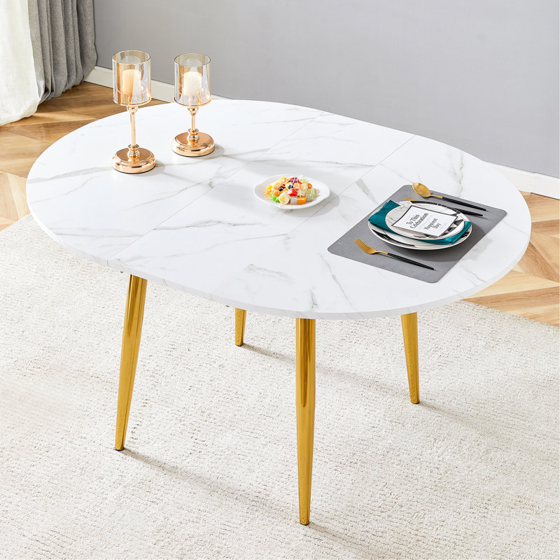 With a clever retractable mechanism, the White Pattern MDF table top and gold metal legs and has a smooth and delicate surface.The unique look creates the sleek silhouette of a modern home.