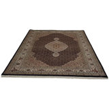 Losh Oriental Area Rug in Black