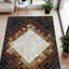 Tapis brun en cuir de vache à motif patchwork brun clair