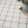 Tysie Geometric Machine Washable Cotton Area Rug in Ivory/Black