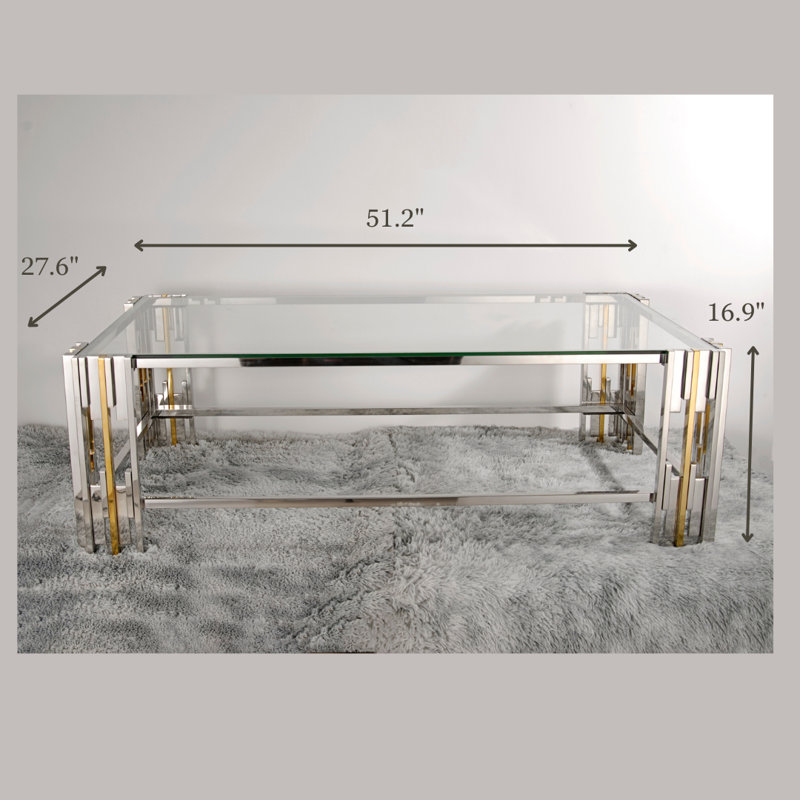 Table basse moderne en verre avec base en métal doré et chromé de forme rectangulaire