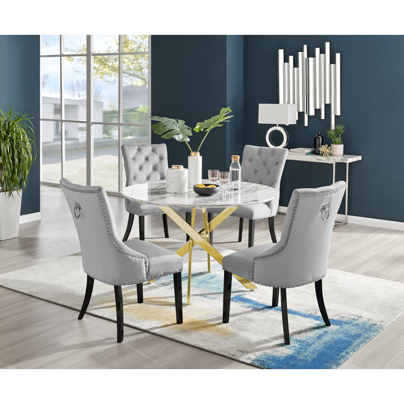 Tierra Sleek Gold Metal and White Gloss Round Dining Table Set with 4 Luxury Velvet Dining Chairs