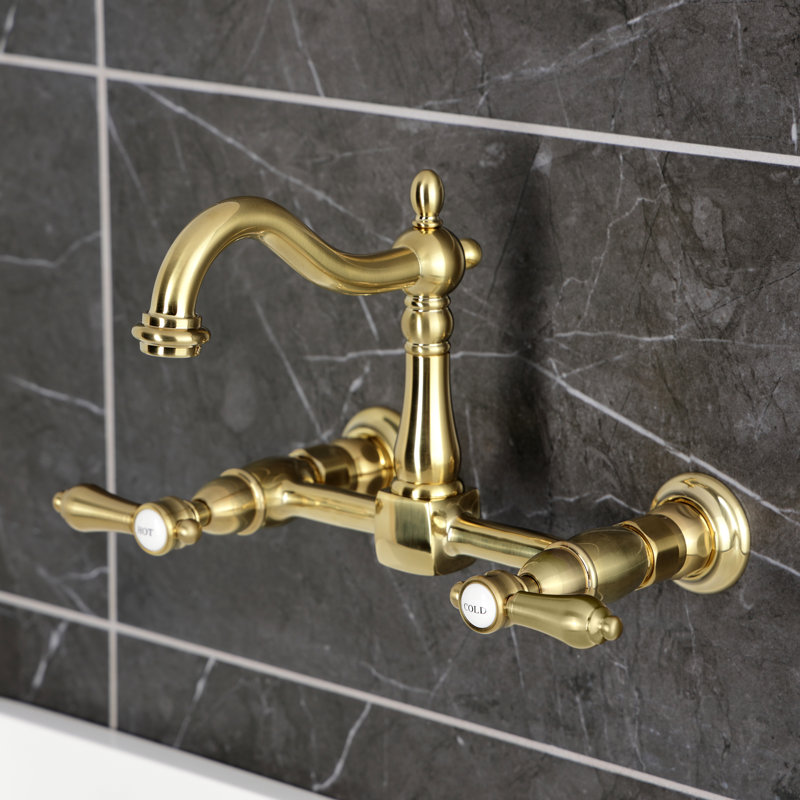 Kingston Brass Heirloom Double-Handle 2-Hole Wall-Mount Bridge Kitchen Faucet, Brushed Brass