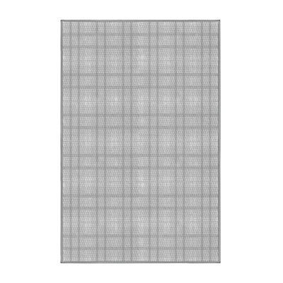 Tapis gris en laine à carreaux