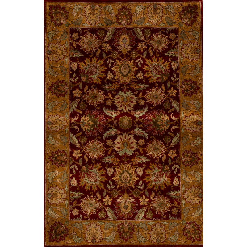 Tapis rouge et or de haute qualité noué à la main
