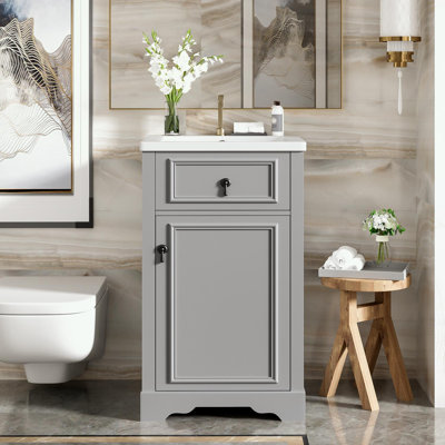 Meuble-lavabo de salle de bain avec lavabo en céramique, tablette réglable et support de rangement fixé à la porte
