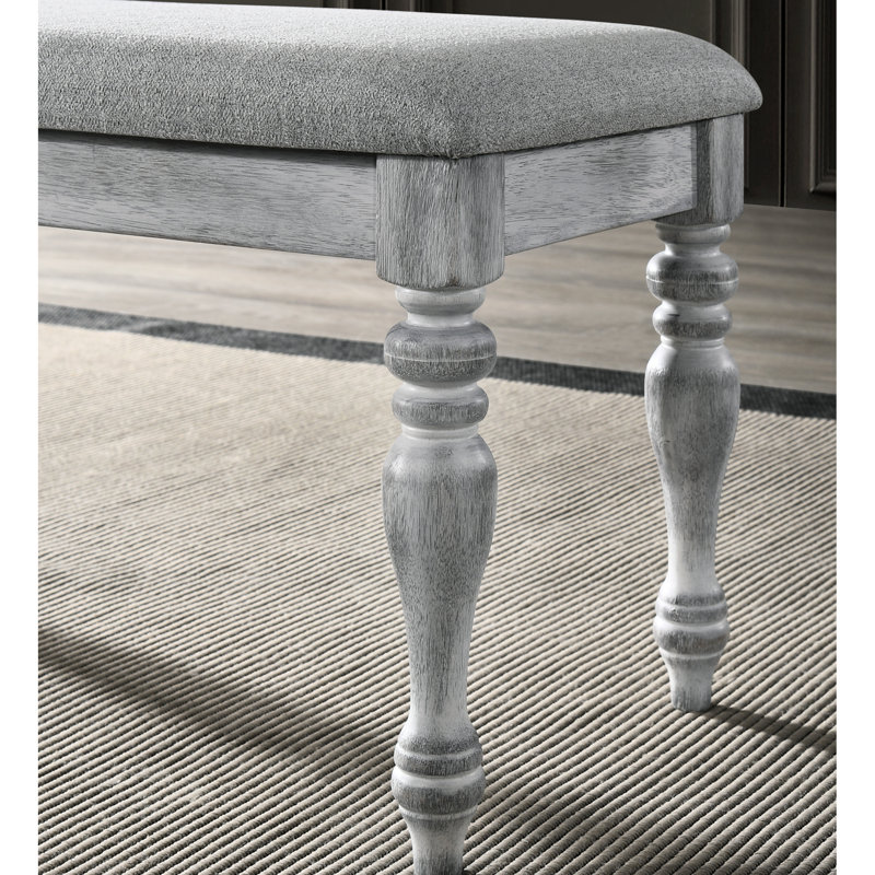 Rustic White Bench With Versatile Upholstery And Leg Structure Turned Surface