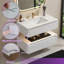 Meuble-lavabo suspendu de 91,4 cm (L) x 52,8 cm (P) avec comptoir en pierre, éclairage DEL intégré, design cannelé à deux niveaux, tiroirs à fermeture amortie, blanc