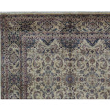 Lamani Wool Oriental Area Rug in Ivory/Dark Blue/Green