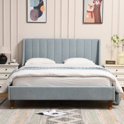 Linvel Upholstered Wingback Platform Bed