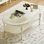 French-style cream-colored solid wood coffee table