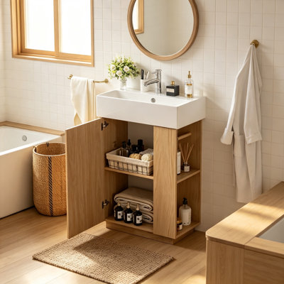 Meuble-lavabo moderne de 21,6 po avec lavabo en céramique et armoire à grain de bois à gauche, parfait pour les petites salles de bain