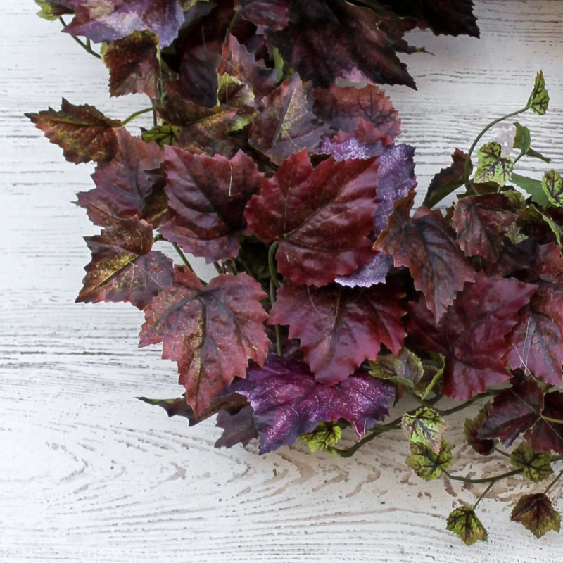 Couronne de porte mauve mauve mauve avec feuillage d'automne automne