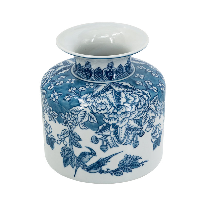Vase rond en porcelaine bleue et blanche avec des motifs de fleurs et d'oiseaux élégants, H 8,3 po x l 7,9 po x P 7,9 po