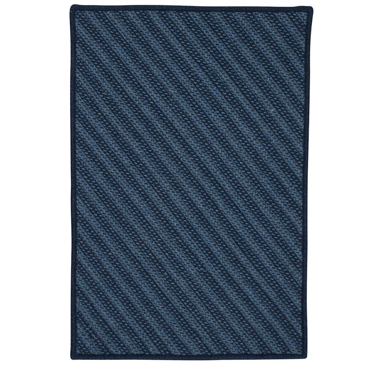 Tapis bleu marine Ommegang