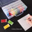 Ensemble de 64 valises d'art en plastique
