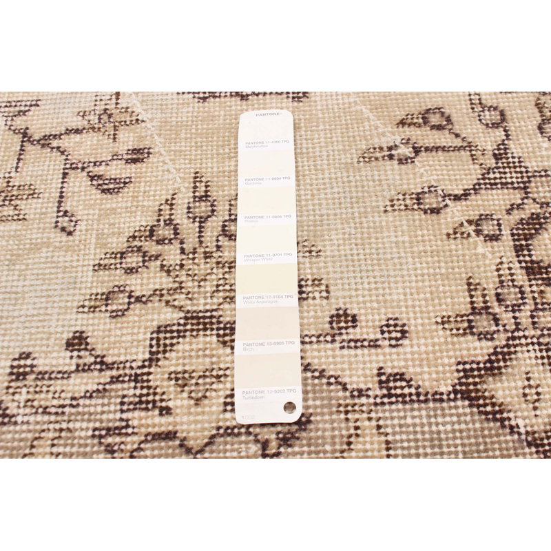 Tapis ivoire rétro Malaylah 3 pi 11 po x 6 pi 9 po