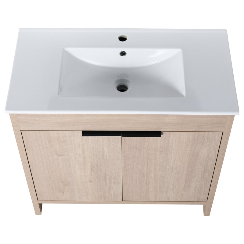 36 Inch Freestanding Bathroom Furniture With Sink. White Ceramic Sink & 2 Soft-Close Cabinet Doors. Plain Oak Luminous. Adjustable Shelf. Metal Handles. Robust Plywood Structure Vanity Freestanding.