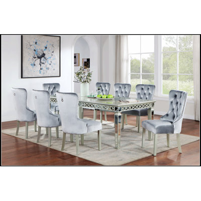 Table de salle à manger argentée avec miroir à feuilles, design glamour contemporain pour mobilier de salle à manger moderne