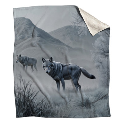 Loups gris dans des couvertures d'hiver