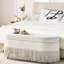 Rangement ovale rembourré en tissu beige L 39 po x l 16 po avec bordure à franges, couvercle relevable, multifonctionnel pour le salon spa