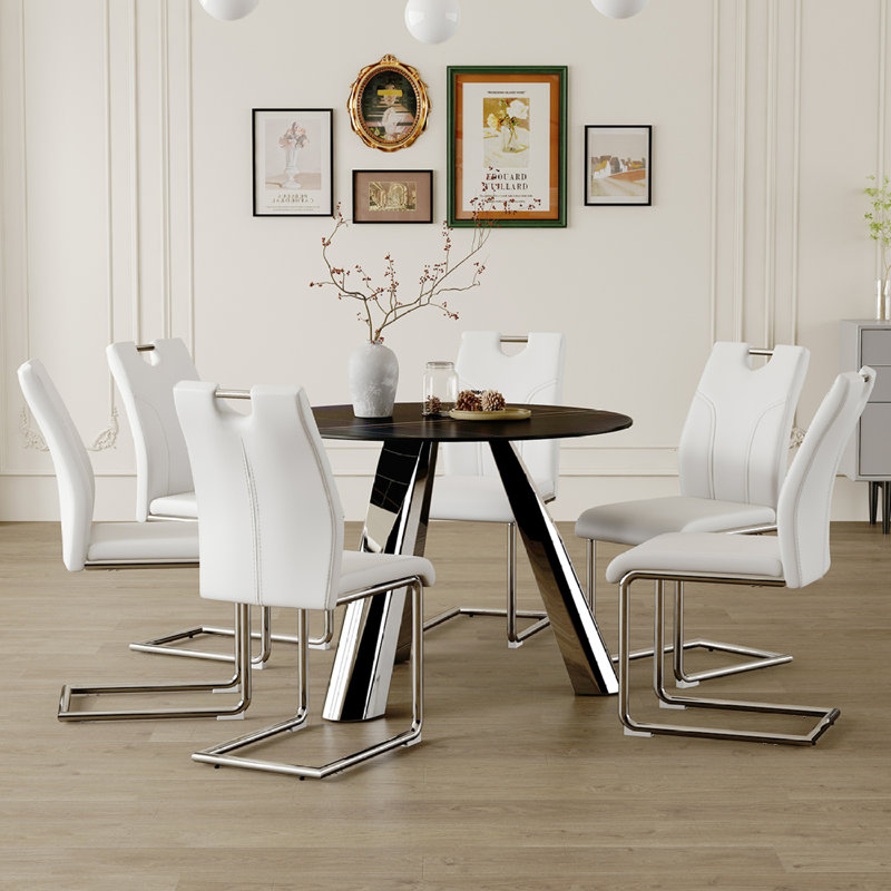 42-Inch Black Sintered Stone Round Table with Stainless Steel Legs and White PU Leather Dining Chairs