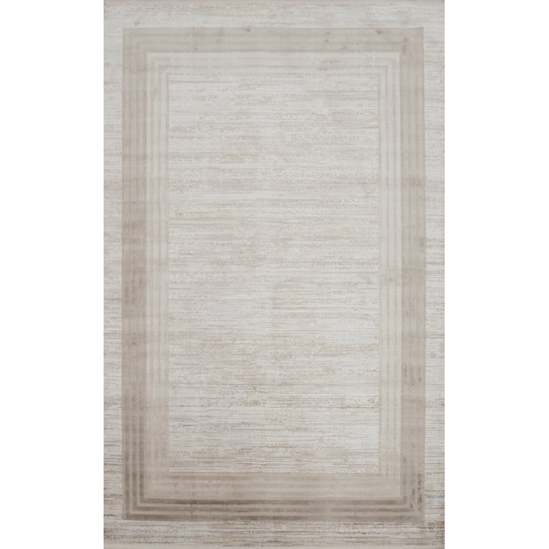 Tapis luxueux texturé beige doux au design moderne