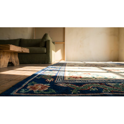 Tapis ivoire antique en laine