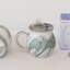 Tasse artisanale en grès avec porte-sachet intégré