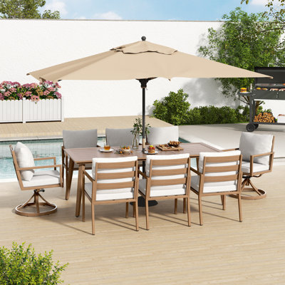 Michael 9-Piece Brown Aluminum Patio Dining Set With Rectangular Table, 2 Swivel Dining Chairs And Light Grey Cushions