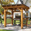 Pavillon de jardin grillagé avec toit en métal à toit rigide, pavillon de barbecue extérieur en bois de cèdre avec tablettes latérales et rail de bar