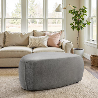 Caras Triangular Upholstered Ottoman