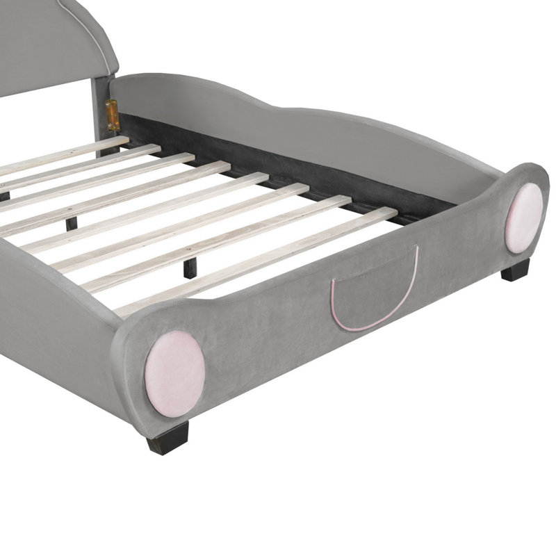 Adorable lit plateforme double avec tête de lit en forme d'ours, offrant confort, sécurité et rangement pour une chambre de rêve