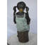 Statue de jeune fille assise et lisant un livre en bronze - Taille: L 16 po x l 12 po x H 27 po.