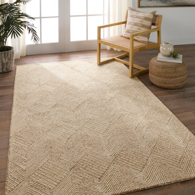 Tapis beige en laine / jute touffeté à la main de couleur unie Oisin