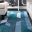 Tapis touffeté à la main à motif géométrique Lilyanna-25409032