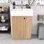 Meuble-lavabo de salle de bain avec lavabo en céramique, rangement ouvert et fermé et porte gauche à fermeture en douceur