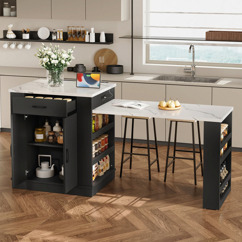 Console d'îlot extensible, avec tiroirs, armoire à deux portes et tablettes ouvertes, sert de table de salle à manger, de bar à déjeuner temporaire et de salon de thé l'après-midi