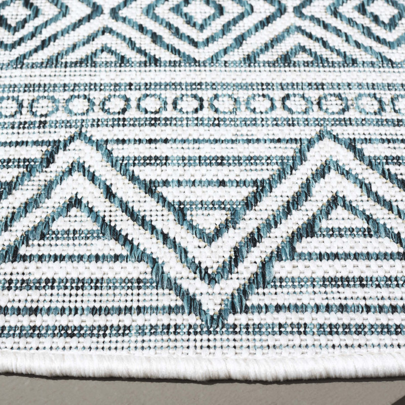 Tapis intérieur / extérieur turquoise Melillo Southwestern, Rond 6 pi 7 po